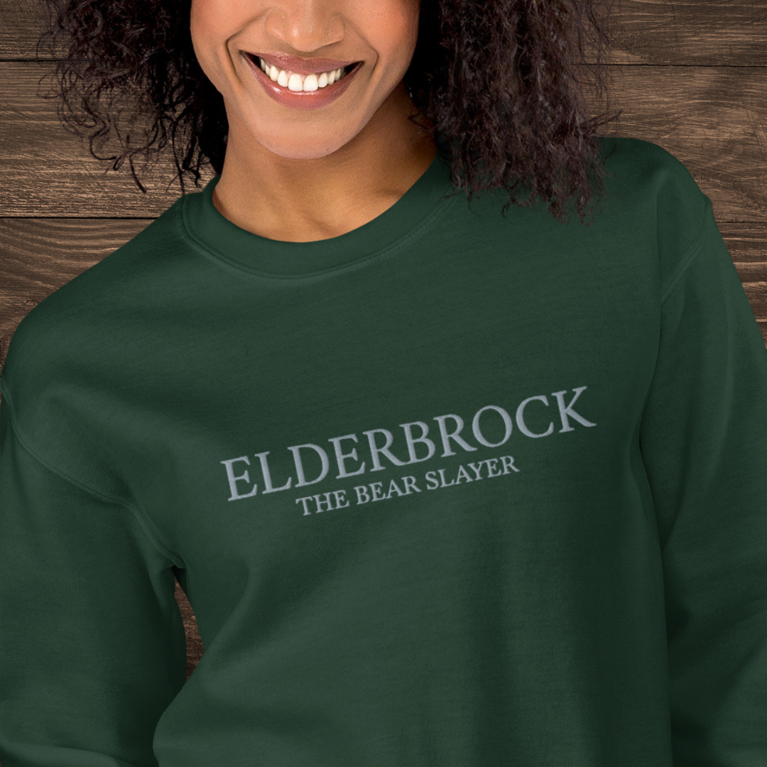 Torj Elderbrock Embroidered Sweatshirt | Officially Licensed Helen Scheuerer